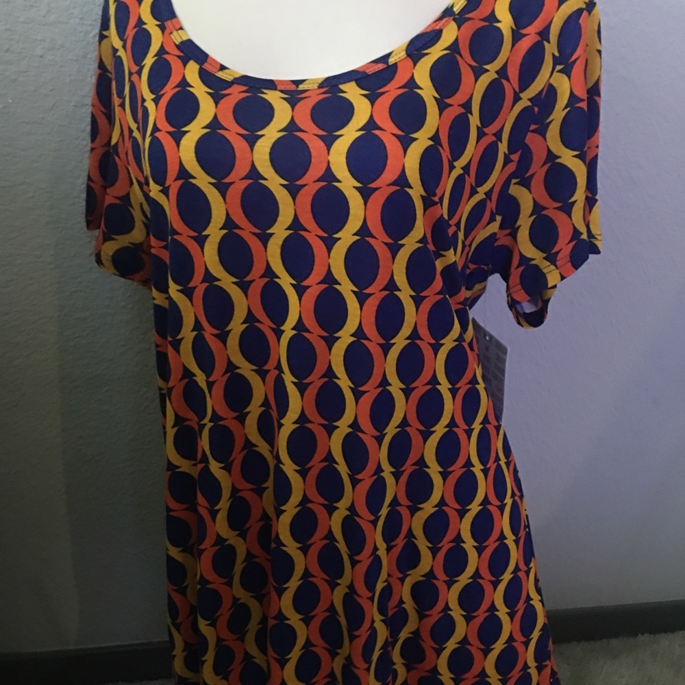 Beautiful orange and purple print LulaRoe top